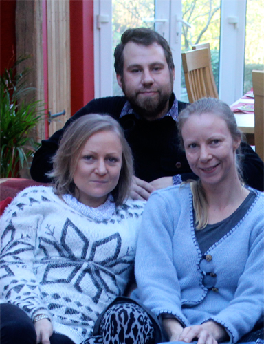 Bride, Groom and Chief Bridesmaid smiling